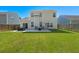 Fenced backyard with a manicured lawn and concrete patio with furniture at 206 Alpine Rd, Summerville, SC 29485