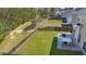 Aerial view of the property's backyard, featuring a patio and a pond at 206 Alpine Rd, Summerville, SC 29485