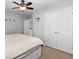 Neutral bedroom with a ceiling fan, wall decor, and double-door closet at 206 Alpine Rd, Summerville, SC 29485