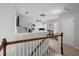 Upstairs bonus room with wood railing, exercise equipment, and ceiling fan at 206 Alpine Rd, Summerville, SC 29485