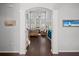 Open-concept living room with hardwood floors, fireplace, comfortable seating, and lots of natural light at 206 Alpine Rd, Summerville, SC 29485