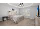Spacious main bedroom with tray ceiling, plantation shutters, and neutral decor at 206 Alpine Rd, Summerville, SC 29485