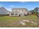 Backyard featuring a patio with outdoor furniture and expansive green space, perfect for outdoor living at 210 Sabal Palmetto Ct, Moncks Corner, SC 29461