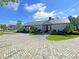 Community building with brick paved parking and nice landscaping at 210 Sabal Palmetto Ct, Moncks Corner, SC 29461