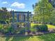 Cypress Ridge community entrance sign with stone pillars, pergola, and well-manicured landscaping at 210 Sabal Palmetto Ct, Moncks Corner, SC 29461