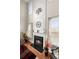 Fireplace with mantel and decor and tall ceilings and windows at 210 Sabal Palmetto Ct, Moncks Corner, SC 29461