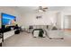Cozy living room featuring a sectional sofa, flatscreen TV, and neutral walls at 210 Sabal Palmetto Ct, Moncks Corner, SC 29461