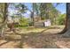 Backyard featuring a shed and grassy area with some dead spots at 213 Braly Dr, Summerville, SC 29485