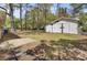 Backyard featuring a shed, grassy area, and various trees at 213 Braly Dr, Summerville, SC 29485