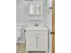 Bathroom featuring a toilet and white vanity with sink and mirror at 213 Braly Dr, Summerville, SC 29485
