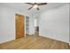 Bright bedroom with hardwood floors, ceiling fan, closet, and neutral walls at 213 Braly Dr, Summerville, SC 29485