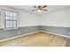 Bedroom featuring hardwood floors, two-tone walls, and a ceiling fan at 213 Braly Dr, Summerville, SC 29485