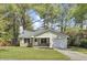 Charming single Gathering home with a brick facade, attached garage and well-kept lawn at 213 Braly Dr, Summerville, SC 29485