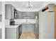 The kitchen features ample gray cabinetry, stainless steel appliances, and plenty of countertop space at 213 Braly Dr, Summerville, SC 29485