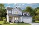 Charming two-story home with light blue siding, a front porch, and a well-manicured lawn at 215 Denham St, Summerville, SC 29486