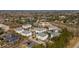 Aerial view of a building complex and the surrounding area with pond at 2244 Ashley Crossing Dr # 1232, Charleston, SC 29414