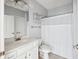 Bathroom with a spacious vanity and a shower with white curtains at 2244 Ashley Crossing Dr # 1232, Charleston, SC 29414