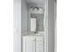 Bathroom featuring a sleek vanity with storage and a well-lit mirror at 2244 Ashley Crossing Dr # 1232, Charleston, SC 29414