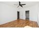 Bright bedroom with hardwood floors and a view of the bathroom and closet at 2244 Ashley Crossing Dr # 1232, Charleston, SC 29414
