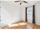 Cozy bedroom bathed in sunlight, featuring hardwood floors and a window with stylish curtains at 2244 Ashley Crossing Dr # 1232, Charleston, SC 29414