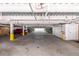 Wide shot of the parking garage with painted yellow lines at 2244 Ashley Crossing Dr # 1232, Charleston, SC 29414