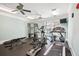 Bright gym room with ceiling fans and work out equipment at 2244 Ashley Crossing Dr # 1232, Charleston, SC 29414