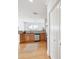 Open-concept kitchen with stainless steel appliances and wooden cabinetry at 2244 Ashley Crossing Dr # 1232, Charleston, SC 29414