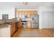 Modern kitchen with granite countertops, stainless steel appliances, and ample cabinet space at 2244 Ashley Crossing Dr # 1232, Charleston, SC 29414