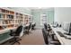 Community library with computers and many book-filled shelves at 2244 Ashley Crossing Dr # 1232, Charleston, SC 29414