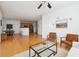 Spacious living room showcasing an open floor plan with hardwood floors flowing into the kitchen at 2244 Ashley Crossing Dr # 1232, Charleston, SC 29414