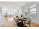 Bright open floor plan featuring a dining area that opens into a comfortable living space at 2244 Ashley Crossing Dr # 1232, Charleston, SC 29414