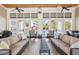 A covered lounge area offers comfortable seating, ceiling fans, and an open design for residents to enjoy the outdoor space at 2244 Ashley Crossing Dr # 1232, Charleston, SC 29414