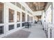 A covered patio area provides residents with a comfortable outdoor space with fans and lounge seating at 2244 Ashley Crossing Dr # 1232, Charleston, SC 29414