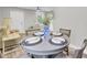 Dining area featuring a round table, seating for four, and a stylish centerpiece at 2325 Sorentrue Ave, North Charleston, SC 29405
