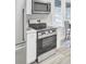 Well-equipped kitchen with stainless appliances and sleek white cabinetry at 2325 Sorentrue Ave, North Charleston, SC 29405
