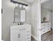 The vanity offers a modern sink, mirror, and lighting at 2916 Louise Dr, North Charleston, SC 29405