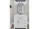 The vanity offers a modern sink, mirror, and lighting at 2916 Louise Dr, North Charleston, SC 29405