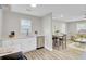 The kitchen offers stainless steel appliances and white cabinets with modern countertops at 2916 Louise Dr, North Charleston, SC 29405