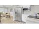 Modern kitchen with stainless steel appliances and white cabinets at 2916 Louise Dr, North Charleston, SC 29405