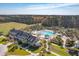 Expansive aerial view of the clubhouse and pool area, surrounded by lush landscaping and offering resort-style amenities at 2951 Clearwater Dr, Mount Pleasant, SC 29466
