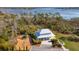 Scenic aerial view of the clubhouse and playground area, set amidst a lush landscape by the water at 2951 Clearwater Dr, Mount Pleasant, SC 29466