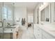 A bright and spacious bathroom offering a modern vanity, a glass-enclosed shower, and a soaking tub at 2951 Clearwater Dr, Mount Pleasant, SC 29466
