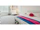 Cozy bedroom area featuring a white metal bed frame and stylish decor at 2951 Clearwater Dr, Mount Pleasant, SC 29466
