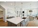 Open kitchen island with a stainless steel sink and dishwasher adjacent to the dining room at 2951 Clearwater Dr, Mount Pleasant, SC 29466