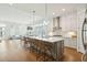 Bright, open kitchen with a large island, pendant lighting, and stainless steel appliances at 2951 Clearwater Dr, Mount Pleasant, SC 29466