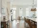 Open-concept living room featuring hardwood floors, a fireplace, and seamless flow to the kitchen at 2951 Clearwater Dr, Mount Pleasant, SC 29466