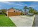 Home with paved driveway and partial fence at 2952 Sweetleaf Ln, Johns Island, SC 29455