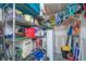 Organized garage with shelving, storage containers, and tools neatly arranged for easy access at 2952 Sweetleaf Ln, Johns Island, SC 29455