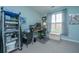 Bright home office with desk, rolling chair and lots of storage and natural light at 2952 Sweetleaf Ln, Johns Island, SC 29455