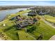 Scenic aerial view of a golf course and waterfront community with lush landscaping and water views at 3075 Maritime Forest Dr, Johns Island, SC 29455